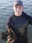 Mark Holding Oysters