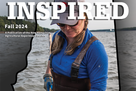 Cover of Inspired Fall 2024 magazine with woman in hat holding fish net in water.