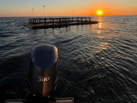 AquaFort moored in place with a happy project manager – Ashley MacDonld and graduate student Samantha Smith.
