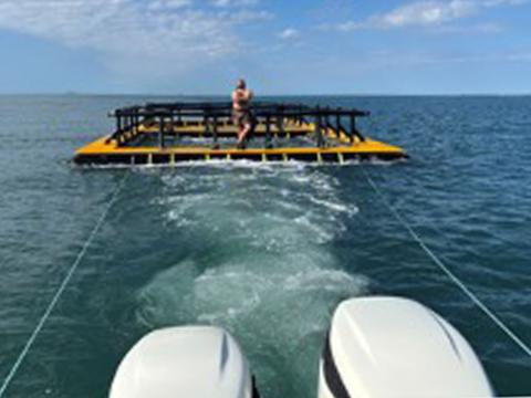 AquaFort deployment and tow to the permitted farm located site 2 miles south of Fort Morgan, AL.