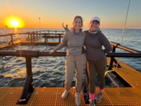 AquaFort moored in place with a happy project manager – Ashley MacDonld and graduate student Samantha Smith.