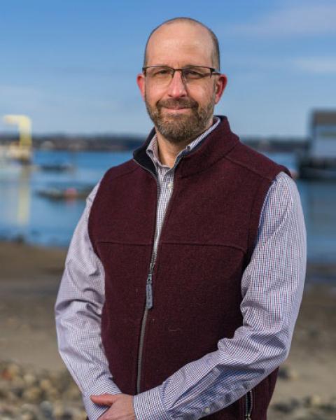 Color photo of David Fredricksson on the shore.