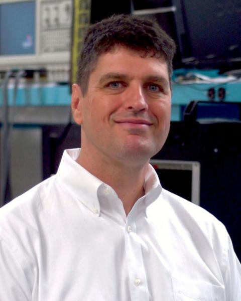 Color photo of employee.